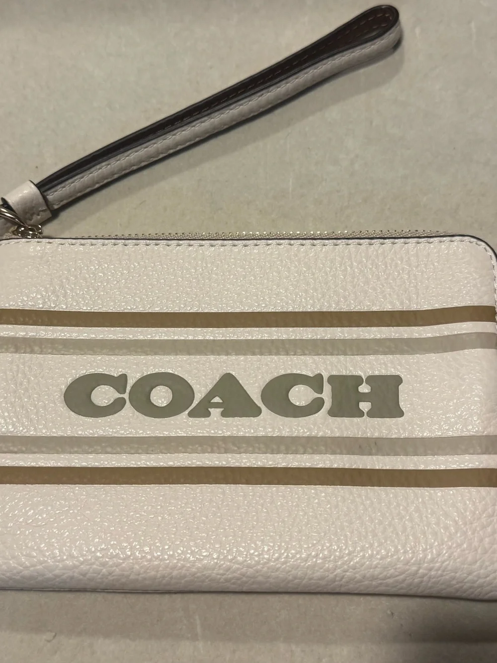 Coach White Pebbled Leather Wristlet with Beige Stripe Accents wristlet